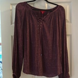 Jennifer Lopez maroon long sleeve blouse.  Tie detail in front.